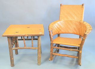 Old Hickory two piece group, to include a woven rocking chair and a matching rectangle side table, table 26 1/2" x 27" x 23".
