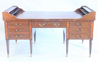 Wallace Nutting mahogany George Washington Desk, having seven drawers, signed in the center drawer, 35 1/4" x 32 3/4" x 65 1/2".