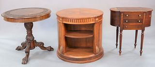 Group of four tables to include carved mahogany tip-top pie crust table, carved walnut table having curved paw feet along with an inlaid mahogany sewi