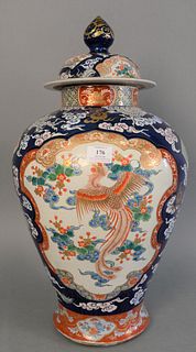 Large Chinese porcelain urn, cover over painted three claw dragon and Phoenix bird, ht. 25".