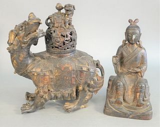 Two Chinese bronzes, large Foo lion bronze censer with reticulated back cover and guardian lion along with bronze figure of a deity seated on a rockin