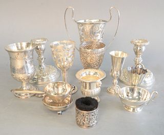 Sterling silver lot to include Tiffany & Co., two handled small dish along with two weighted S. Kirk & Son candlesticks, 25.7 t.oz.