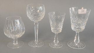 Thirty-eight piece group of Waterford to include set of six stemmed goblets, set of five champagnes, eight white wines, eleven red wine, pitcher, ice 