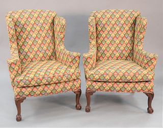 Pair of Chippendale style geometric upholstered wing armchairs, ball and claw feet. 44" x 34" x 26".