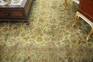 Room size Oriental carpet, flower pattern in tans, browns and greens, 10' X 14' 6 ".