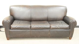 Pottery Barn three-cushion sleeper sofa with brown leather, ht. 33", wd. 82", dp. 36".