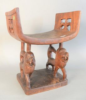 Ashanti wooden stool, carved animal figures. 21 1/2" x 18" x 12". Provenance: Purchased in Togo in the 1960s.