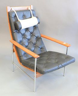 Mid Century modern Rosewood armchair, bent wood and chrome frame, with leather straps and black leather cushions, 36 1/2" x 24" x 27".