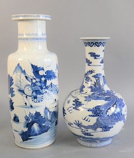 Two Chinese blue and white porcelain cases, one having painted dragon and the other with painted warriors in landscape, ht. 18 1/2".