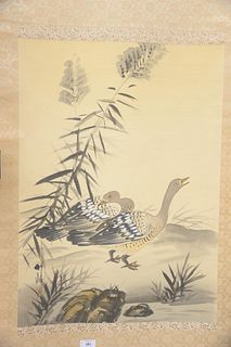 Three piece lot to include, a pair of Oriental scrolls, watercolor on silk of two ducks and with cloth of an emperor, along with a Guanyi carved figur