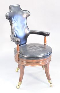 Black leather swivel office armchair, 42" x 24" x 22".