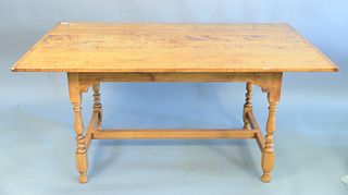 D.R. Dimes Windsor style dining table having tiger maple top, stretcher base, and extendible leaves for each end, ht. 29 1/2", top 36" x 62". Provenan