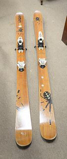 Pair of wood veneer snow skis made by Skilogik, model "Ullr's Chariot 178" with large spider detail, lg. 68 1/2".