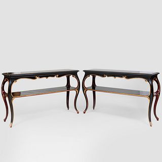 Pair of Louis XV Style Ebonized and Parcel-Gilt Two Tier Console Tables