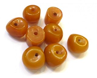 Eight Amber Beads