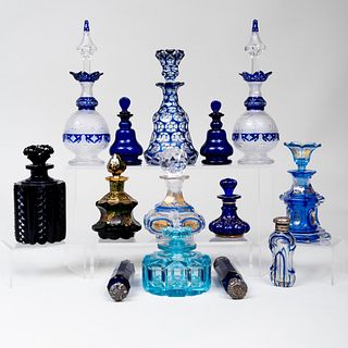 Group of Blue Overlay and Gilt-Decorated Glass Scent Bottles and Stopper