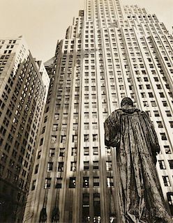 Berenice Abbott (American, 1898-1991)      John Watts Statue from Trinity Churchyard Looking Toward One Wall Street