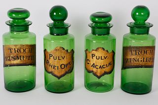 Four Green Glass Apothecary Bottles