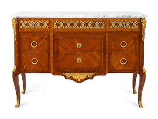 A Pair of Louis XVI Style Gilt-Bronze-Mounted Kingwood and Tulipwood Commodes
Height 36 x length 52 x depth 19 1/4 inches.