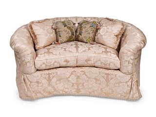 A Contemporary Damask-Upholstered Settee
Height 30 x length 60 x depth 38 inches.