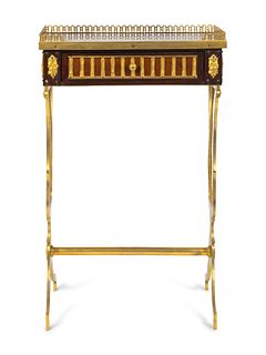 A Louis XVI Style Gilt-Bronze and Parquetry Table en Chiffoniere
Height 26 1/2 x width 16 1/2 x depth 12 inches.