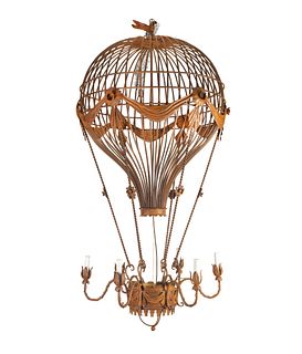 A Patinated Metal Six-Light Montgolfier Chandelier
Height 55 x diameter 30 inches.