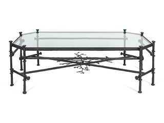 A Contemporary Bronze and Glass Cocktail Table
Height 18 x length 58 x width 31 inches.