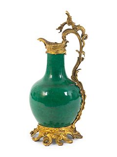 A Louis XV Style Gilt-Bronze-Mounted Chinese Porcelain Ewer
Height 19 x width 9 inches.