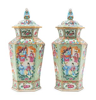 A Pair of Chinese Export Rose Medallion Porcelain Vases and Covers
Height 13 1/2 x width 7 inches.