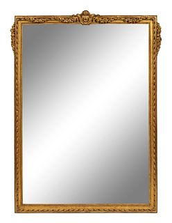 A Louis XVI Style Giltwood Mirror
Height 48 1/2 x width 37 inches.