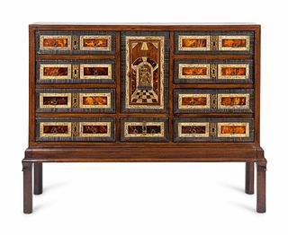 An Italian Inlaid Walnut and Mahogany Cabinet on Later Stand
Height 29 1/4 x width 38 x depth 12 inches.