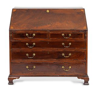 A George III Inlaid Mahogany Slant-Front Desk
Height 42 1/2 x width 45 x depth 22 inches.