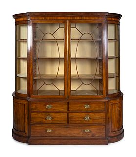 A George III Style Mahogany Breakfront
Height 81 1/2 x width 76 1/2 x depth 23 1/2 inches.
