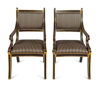 A Set of Eight Regency Style Parcel-Gilt and Black-Painted Armchairs
Height overall 40 x width of seat 23 inches.
