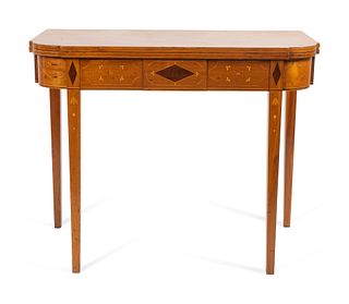 A Federal Inlaid Maple Game Table
Height 30 x width 36 x depth 18 inches.