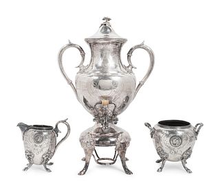 An American Silverplate Three-Piece Tea Service
Height of tea urn 16 /2 inches.
