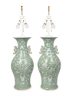 A Pair of Chinese Celadon and White Glazed Baluster Vases Mounted as Lamps
Height of vase 24, overall 38 1/2 inches.