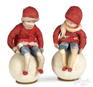 Two Huebach children on a snowball candy containe