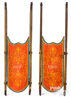 Pair of Romeo and Juliet painted child's sleds