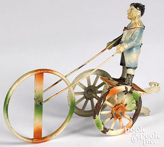 German painted tin squeeze toy