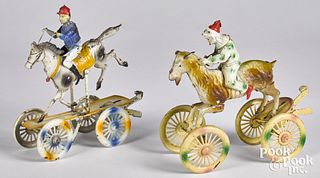 German painted tin horse and rider platform toys