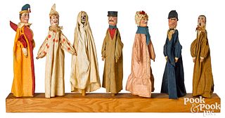 Seven carved wooden head Punch and Judy puppets