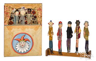Eight composition Punch and Judy puppets and stag