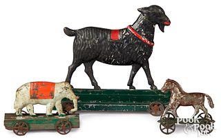Three early painted tin platform pull toys