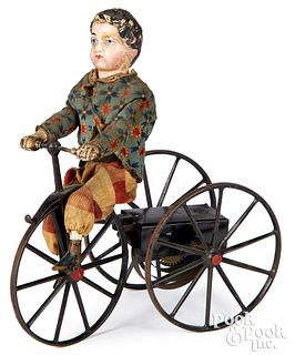 Clockwork composition boy on a velocipede