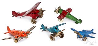 Five cast iron airplanes