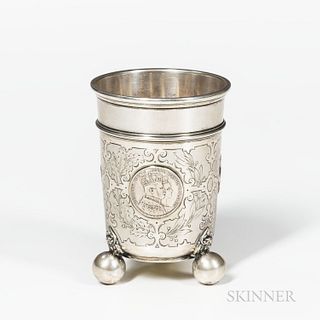 Continental .750 Silver Beaker, late 19th century, with three coins mounted to sides on bun feet, ht. 4 7.8 in., approx. 7.5 troy oz.