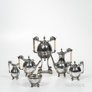 Six-piece Gorham Silver Tea and Coffee Service, Providence, c. 1879, each with an engraved coat of arms, comprised of a hot water urn,