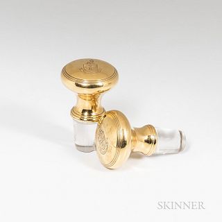 Two Tiffany & Co. 18kt Gold-mounted Stoppers, New York, 1907-47, each with an engraved coat of arms, ht. 2 1/4 in.
