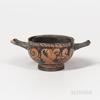 Ancient Apulian Red-figured Stemless Kylix, c. 320 B.C., painted with the head of woman to each side, ht. 6 3/4 in.